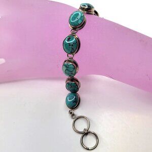 Turquoise Hued Oval Cabochon Link Bracelet